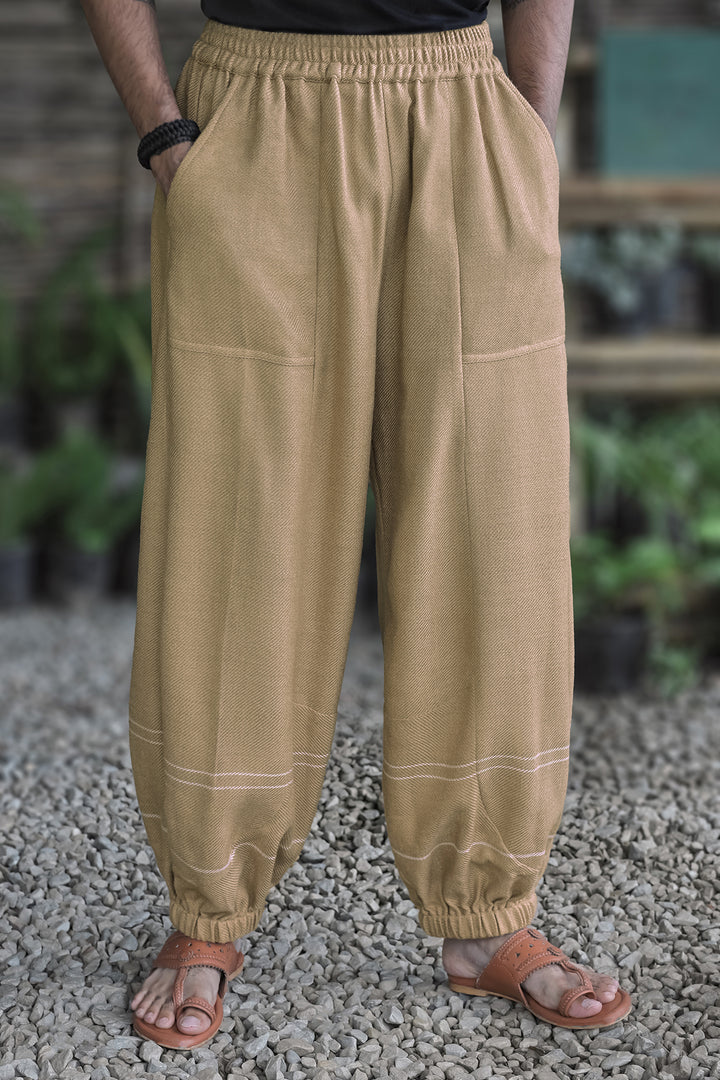 Balloon Pajama – Beige, front view: elasticated waist, side pockets and gathered ankles