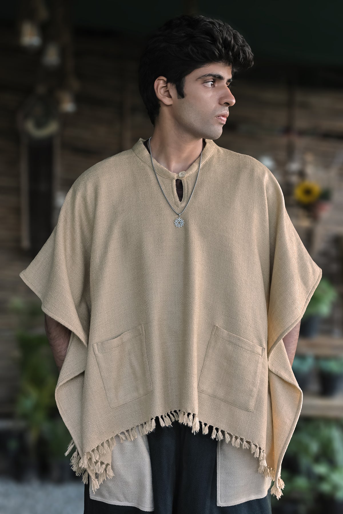 Drift Top – Oatmeal, front view: band collar, cape-like sleeves and fringed hem