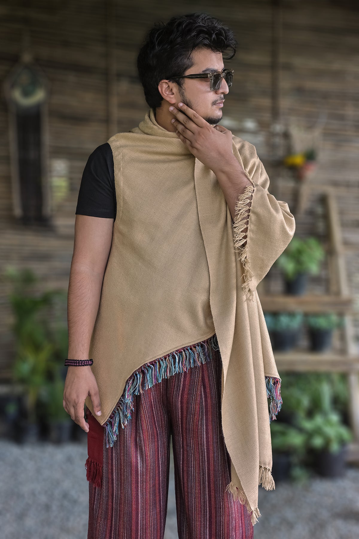 Dune Cape – Sand with one side thrown over the shoulder, showing the multicolour fringe