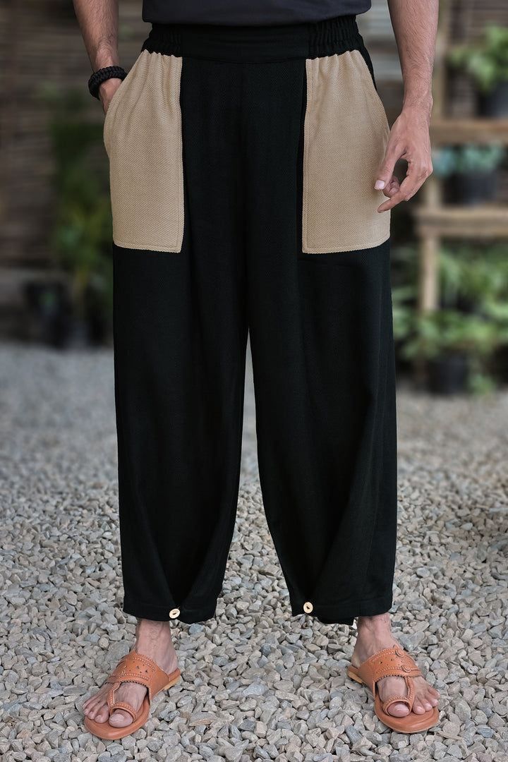 Mellow Pants – Deep Forest, front view with contrast sand-beige patch pockets