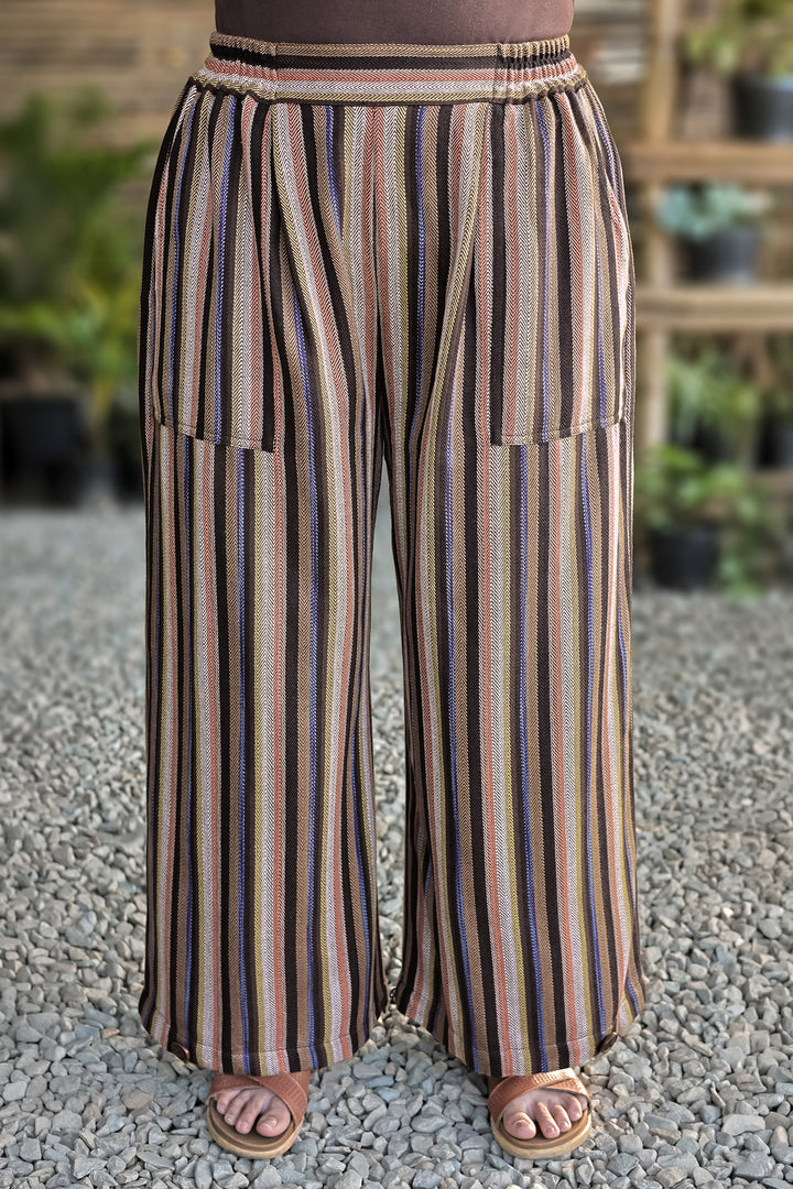 Mellow Pants – Multicolour, front view: handloom stripes, elasticated waist and patch pockets