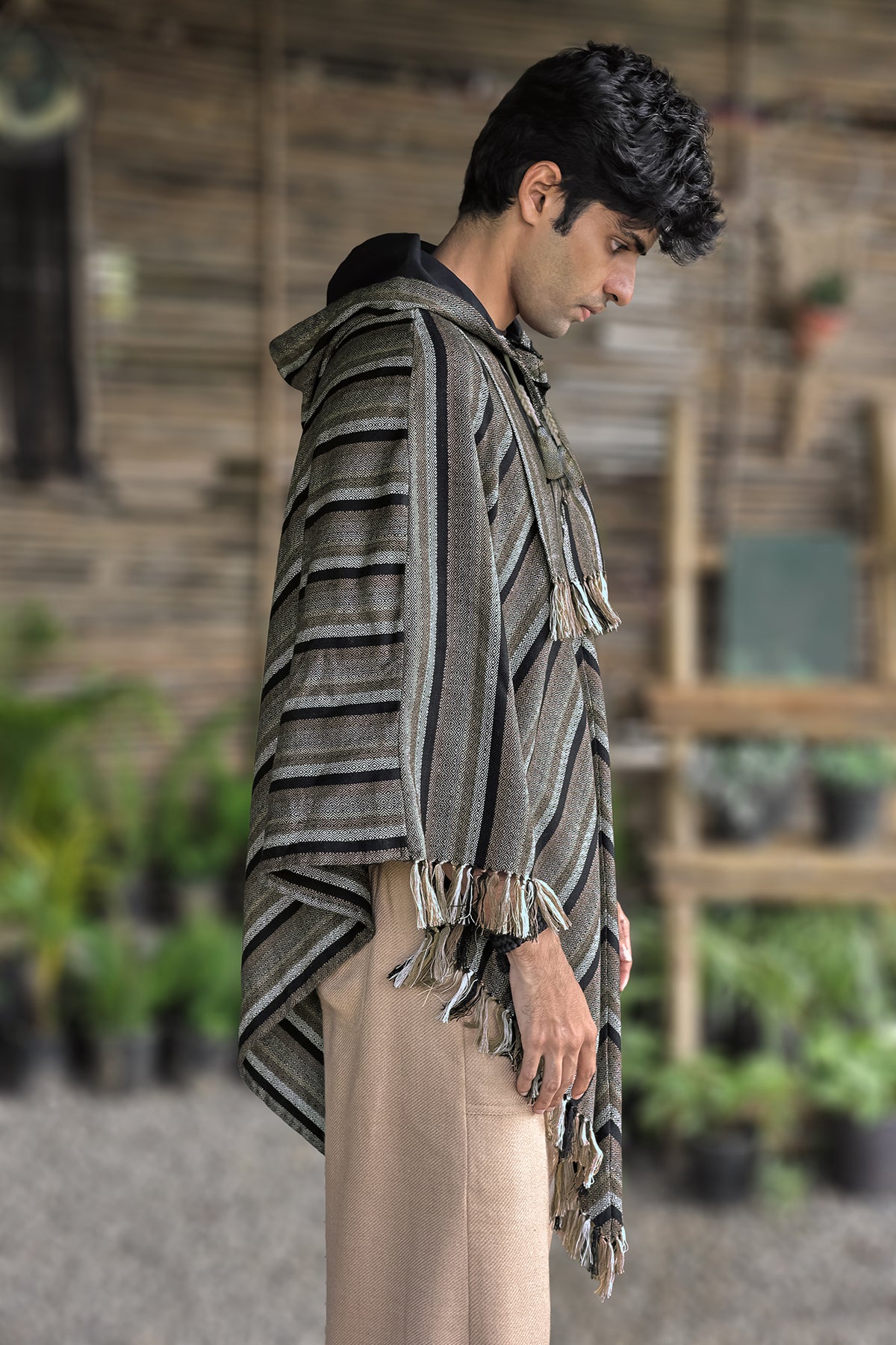 Poncho – Black/Beige, side view with the hood down